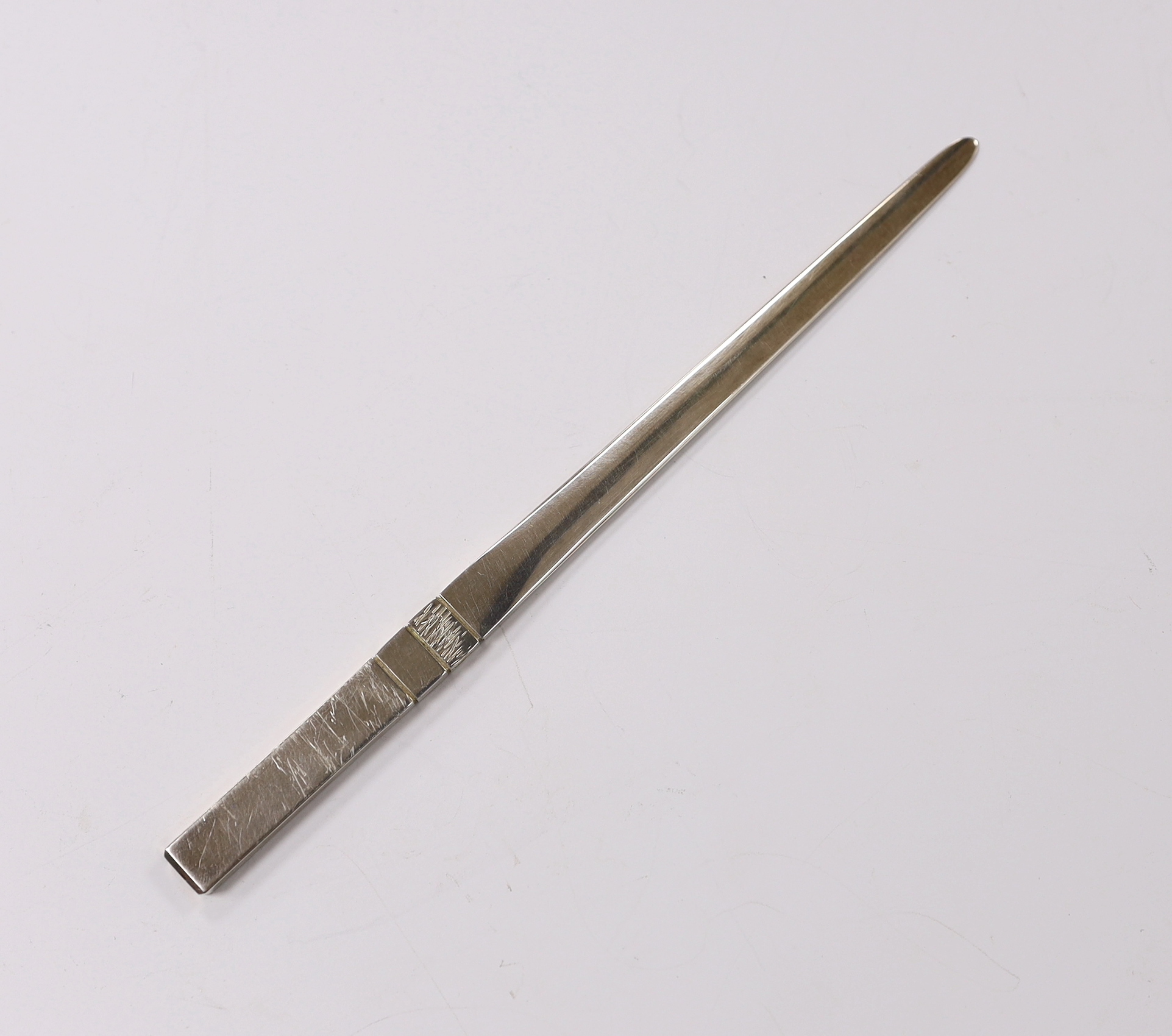 An Elizabeth II part textured silver paper knife, by Pruden & Smith, Sheffield, 2005, 18.4cm, 46 grams, with original box.